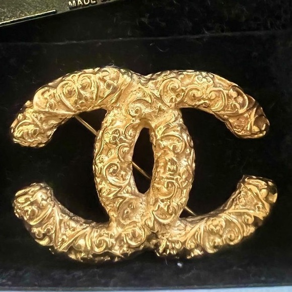 CHANEL Jewelry - Chanel 24k gold plated hardware Lava CC brooch